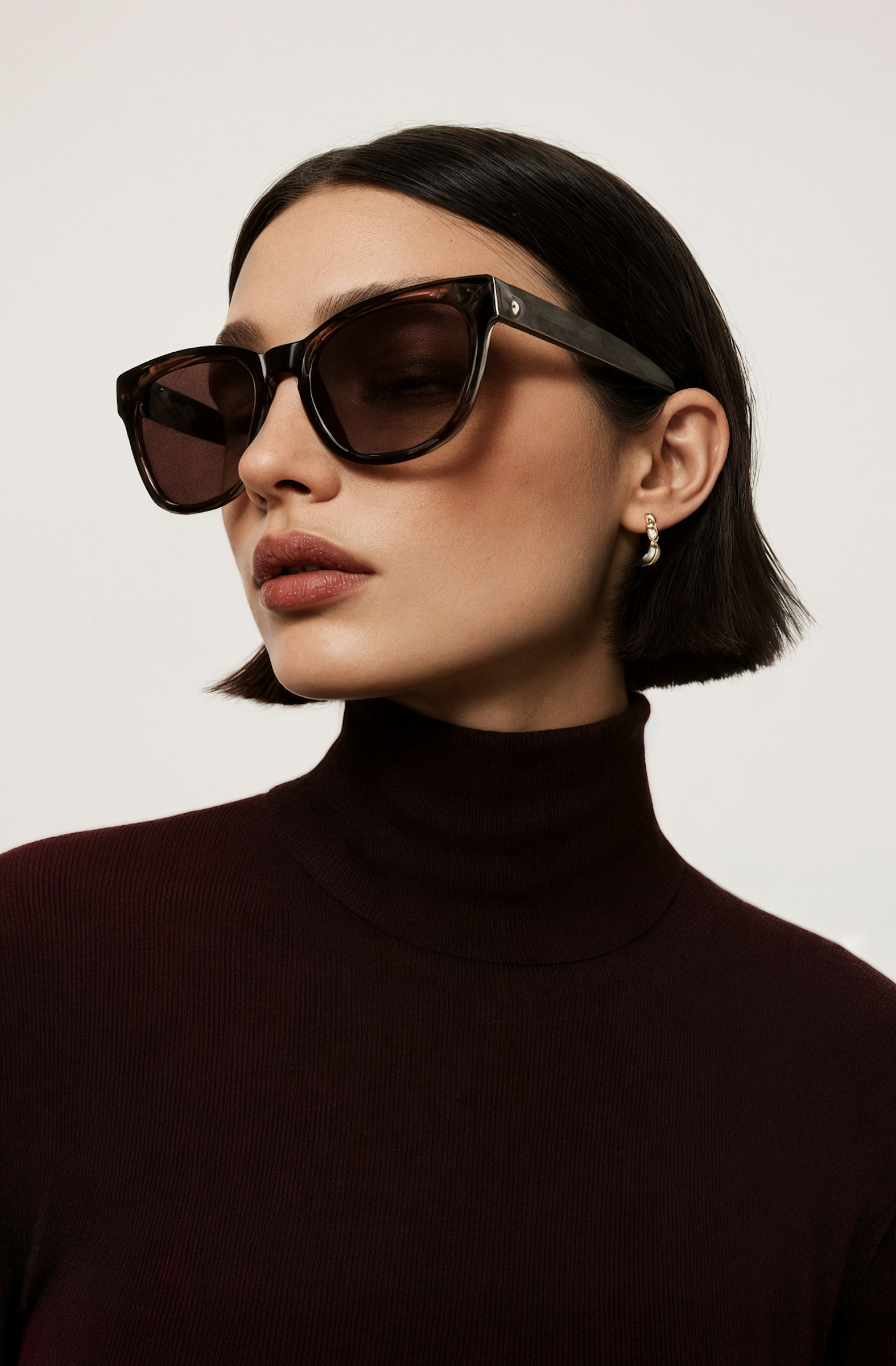 Studio portrait wearing sunglasses