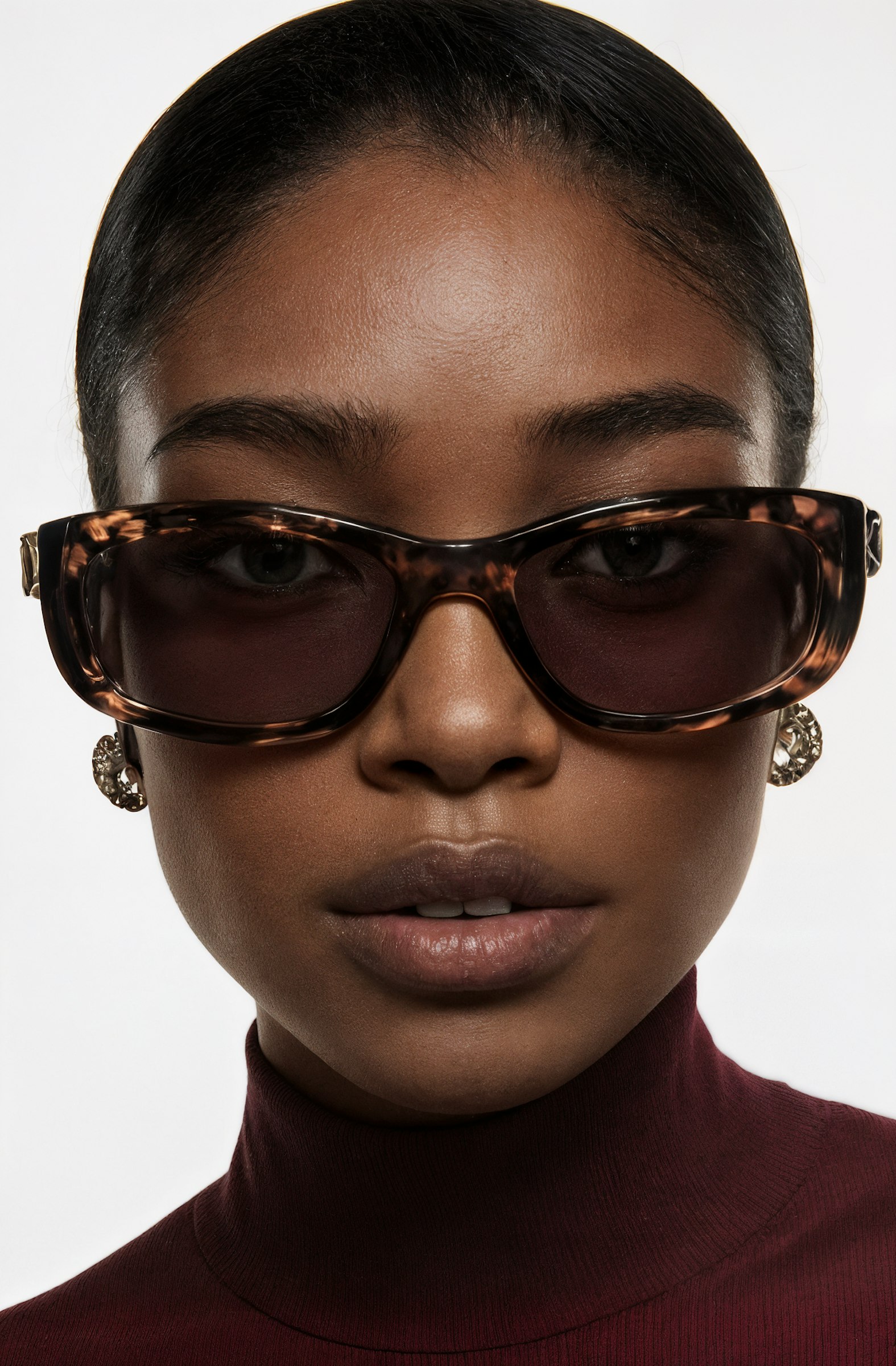 Studio portrait wearing sunglasses